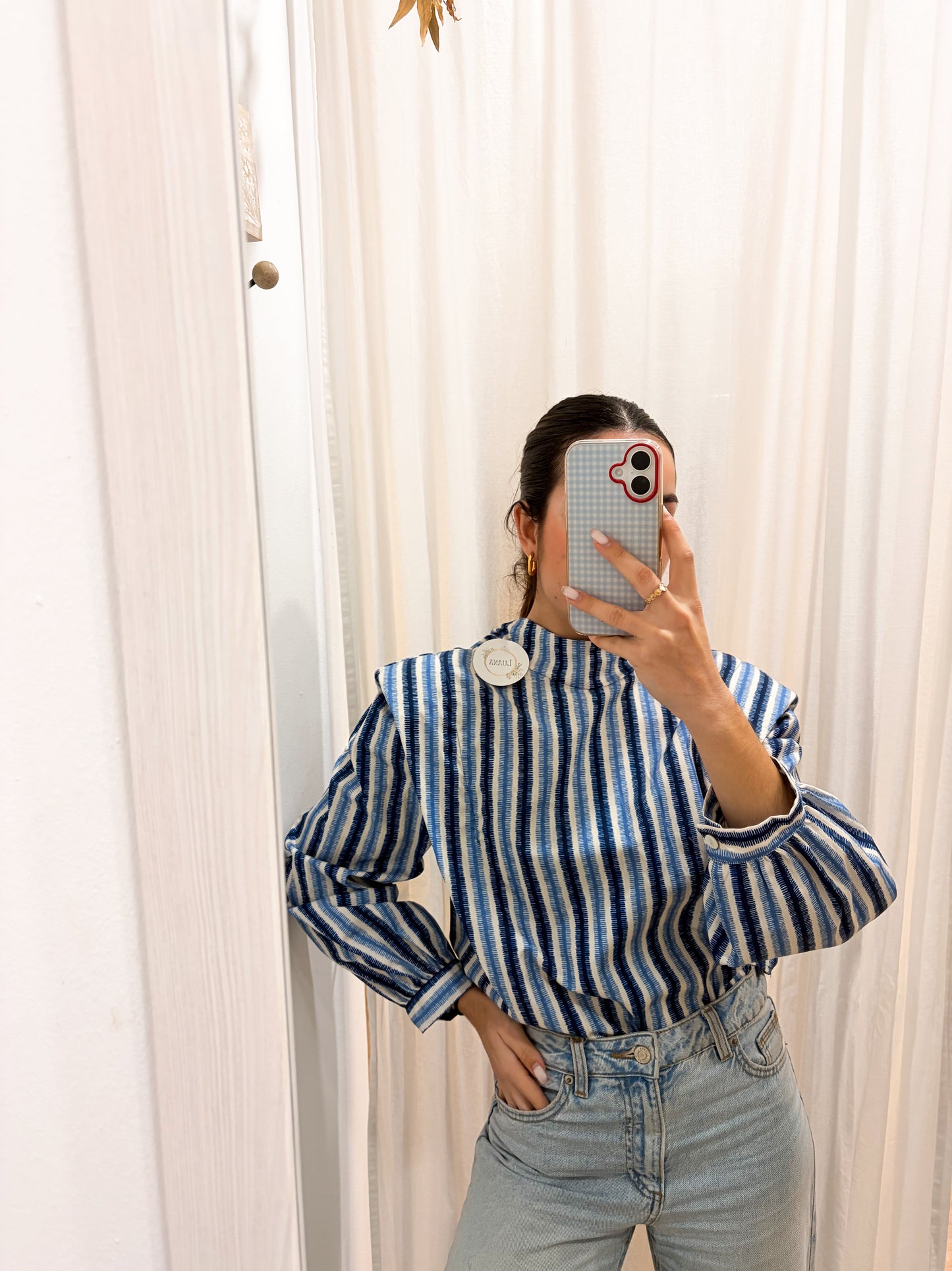 Blusa hombreras estampada