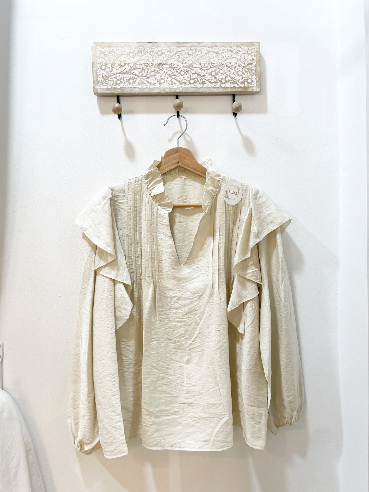 Blusa beige volante