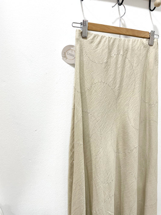 Falda beige brillo