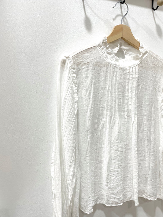 Blusa plisado blanca