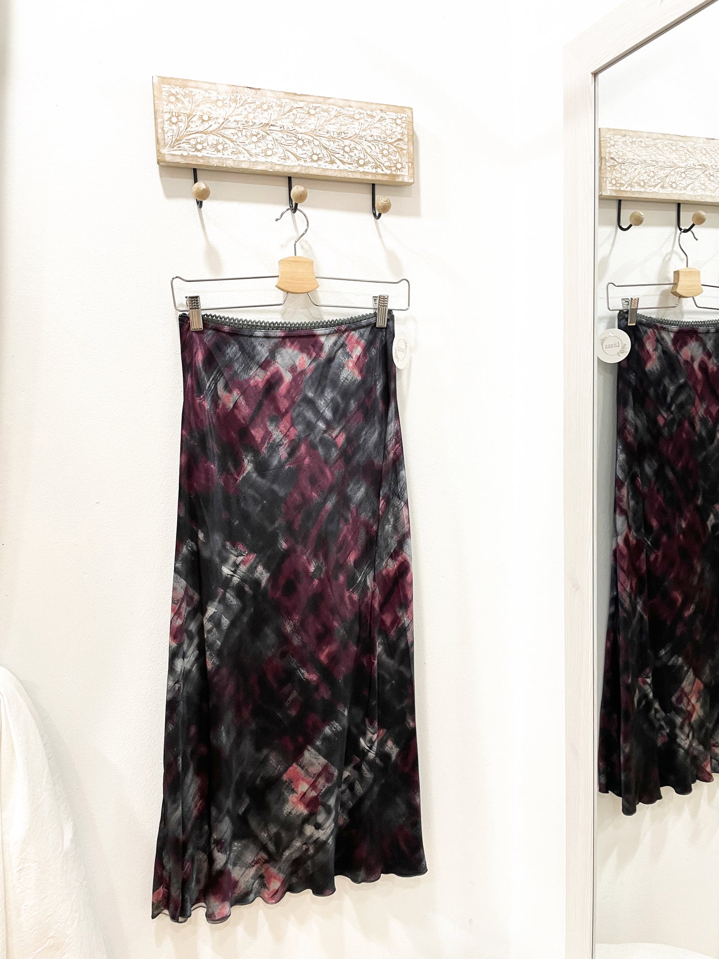 Falda satinada manchas